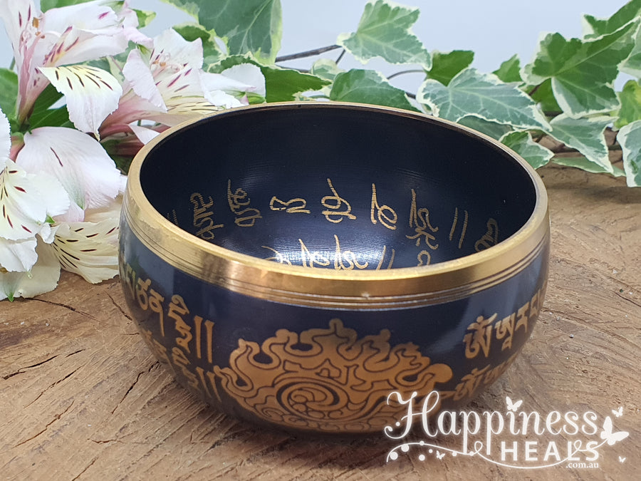 Black Singing Bowl with Om Symbols: Harmonize Your Energy