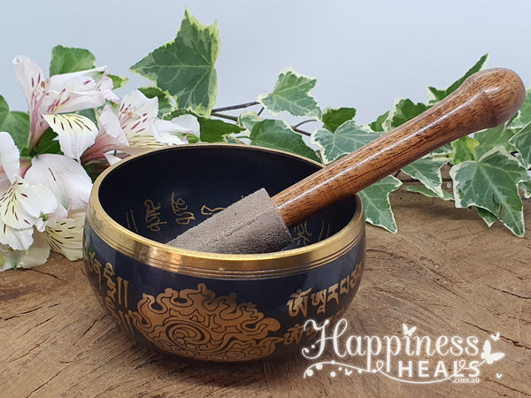 Black Singing Bowl with Om Symbols: Harmonize Your Energy