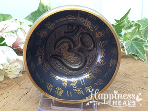 Black Singing Bowl with Om Symbols: Harmonize Your Energy