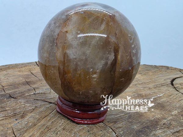 Punto de cuarzo sanador dorado