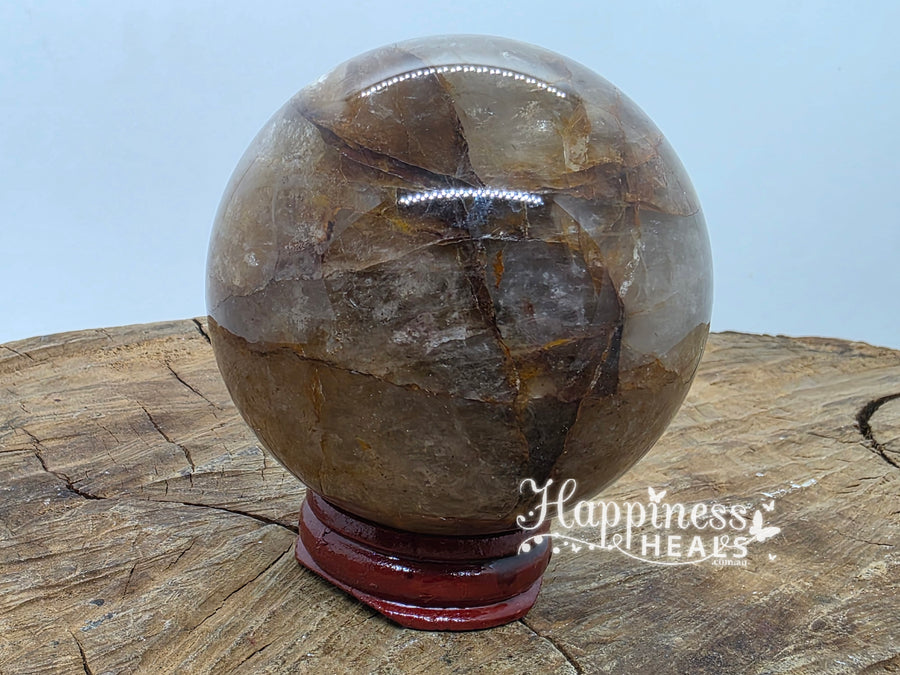 Punto de cuarzo sanador dorado